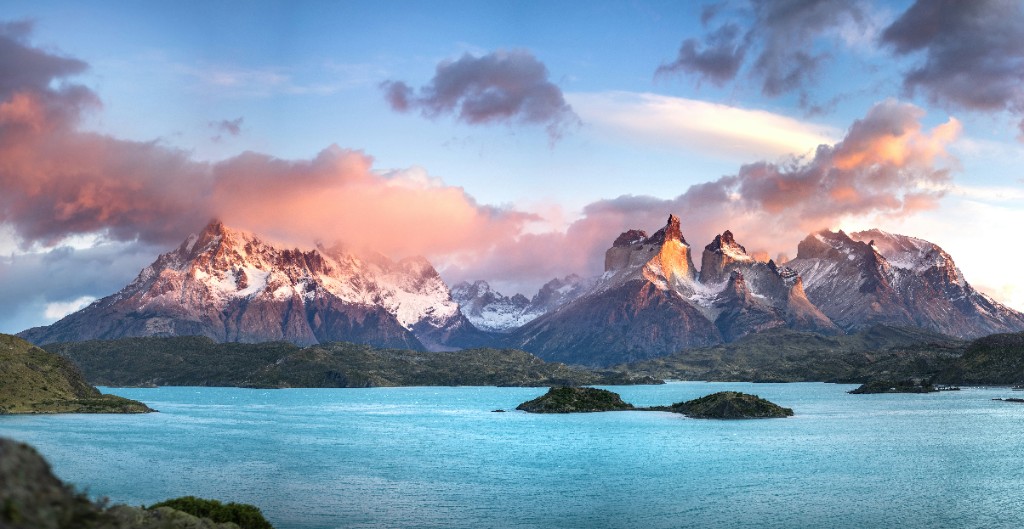 The three granite towers of Torres del Paine rising above a turquoise lake, Patagonia, Chile