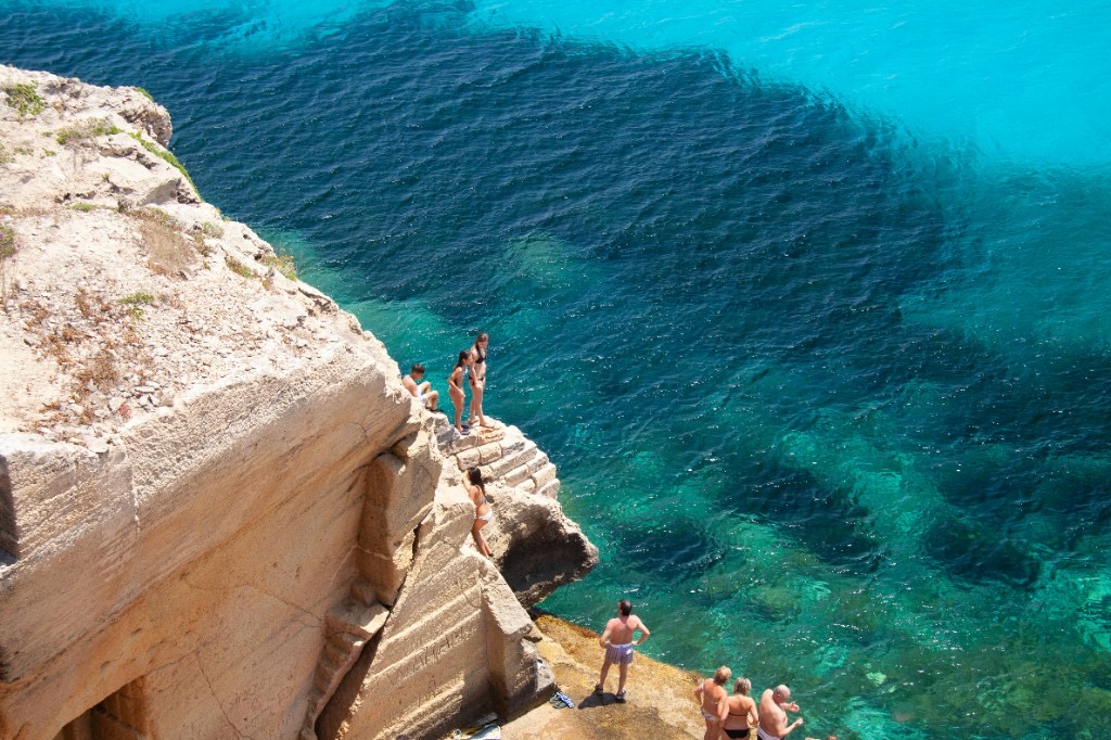 Clear turquoise water and white sand at Cala Azzurra, Favignana, Sicily